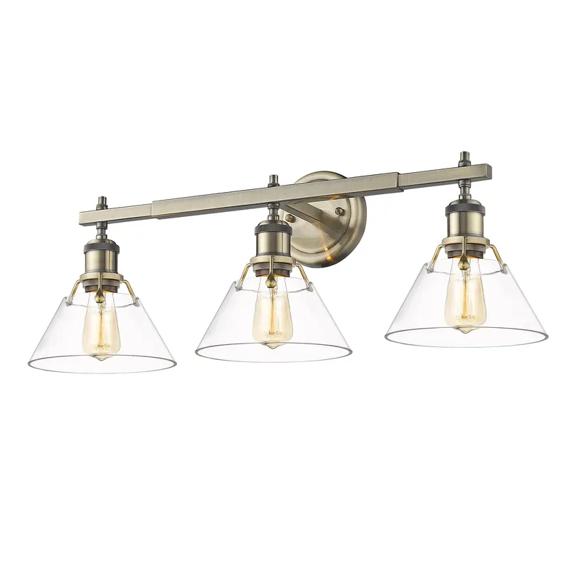 Yep by Golden Lighting Orwell 3-light Vanity in Aged Brass and Clear Glass — Golden Lighting LED Wall Lights  